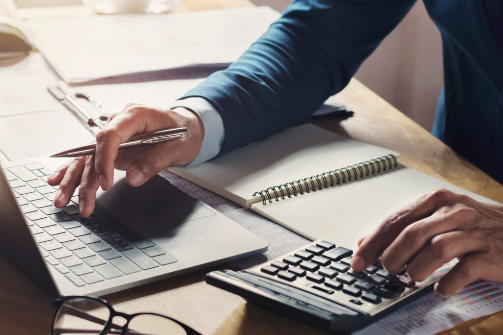 financial advisor working on a laptop